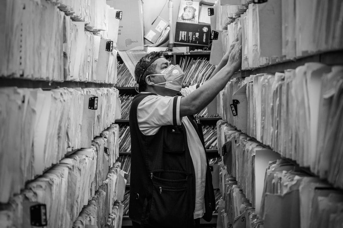 Filing shelves and folders in a small business administration office